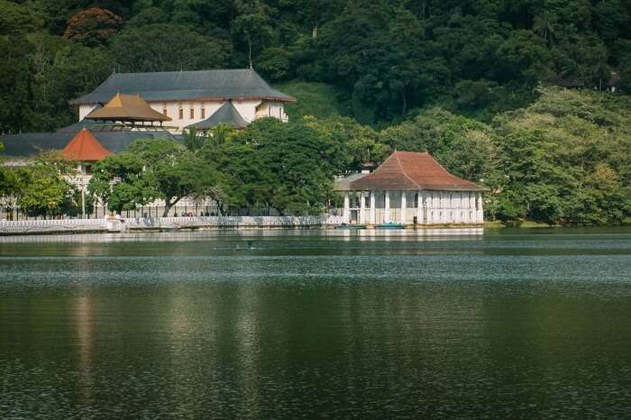 A shot of the Temple of Tooth Relic and the Kandy Lake in Sri Lanka