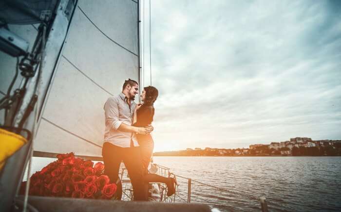 A couple onboard a catamaran 