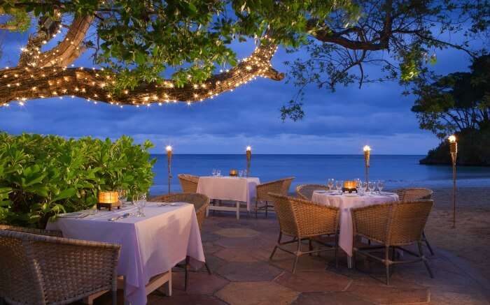 A romantic dinner setting overlooking Caribbean sea 