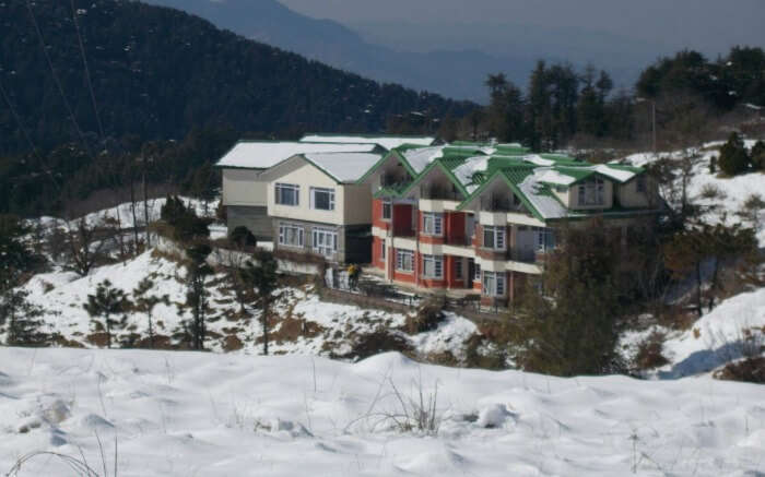 A view of Cedar Heights Resorts surrounded by snow from all sides