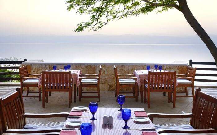 Breakfast tables on terrace with the views of Indian Ocean