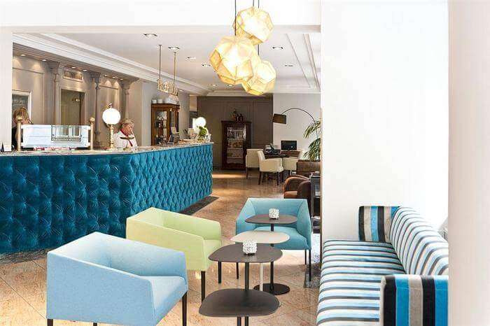 blue color furniture at the reception area of a hotel