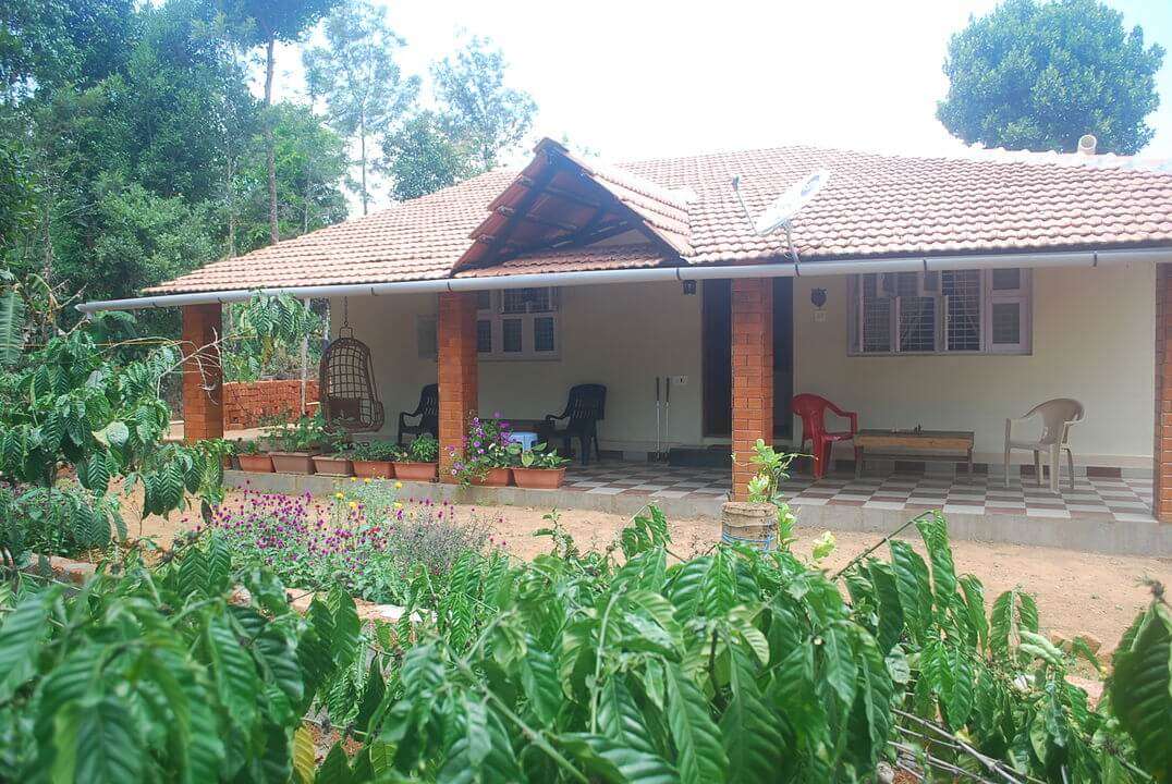 A Kannada style home with a porch
