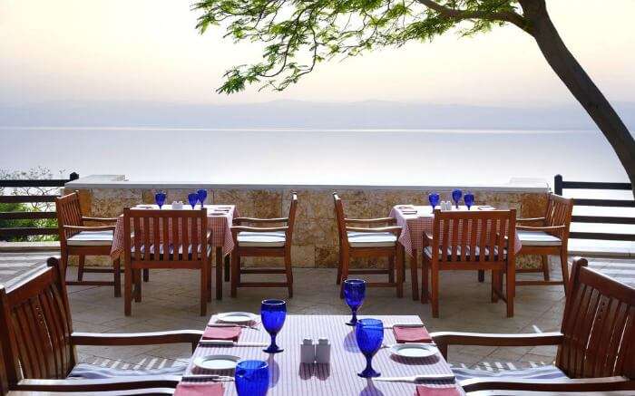 a romantic terrace restaurant with sea views