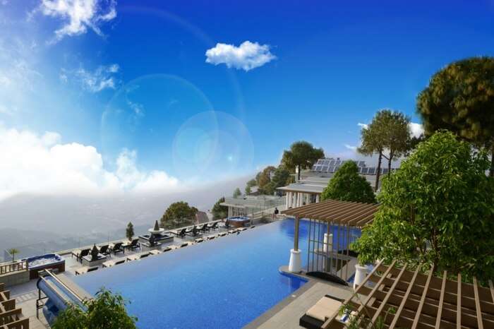 The majestic view of the vast nature from the infinity pool of Moksha Spa in Solan