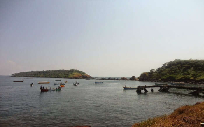 boats in the water of Pequeno Island 