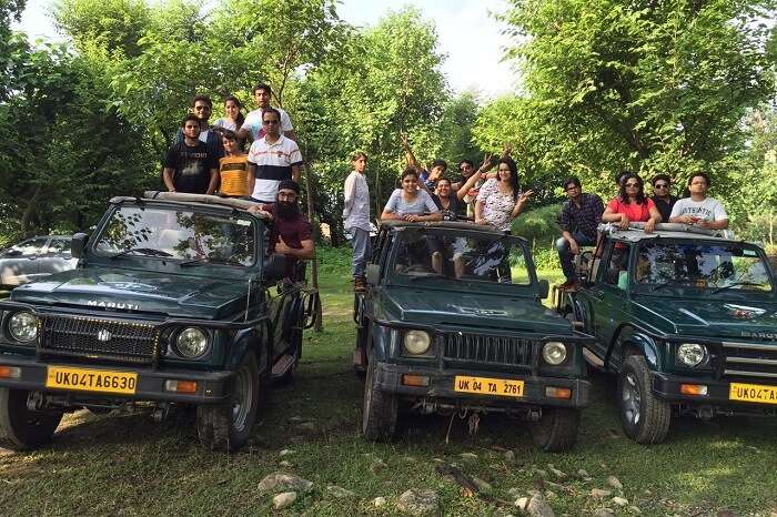 Travelers after completing a jeep safari in Jim Corbett