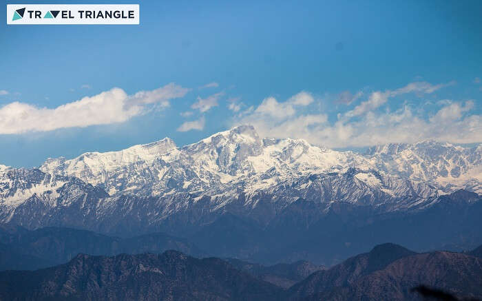 A view of the snowcapped hills from Kanatal