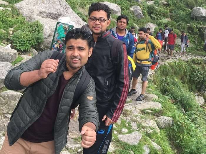 A group of travelers on one of the weekend trips from Delhi to Mcleodganj taking a trek to Triund