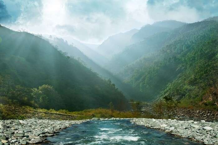 Sun rays reaching the river water near Shimla