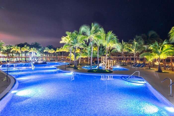 Swimming pool at a luxury Caribbean resort at night