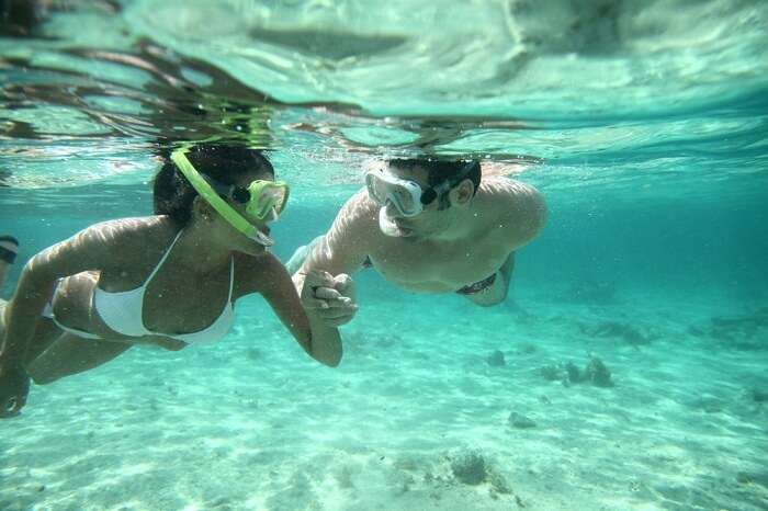 Couple snorkeling in Caribbean waters