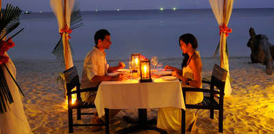 Romantic dinner setting on a beach