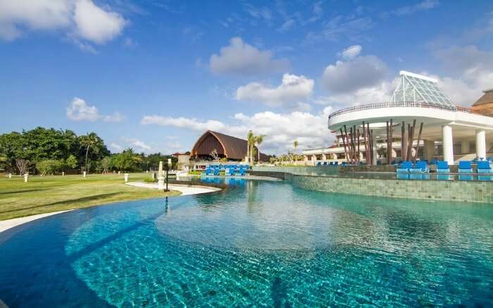 A huge outdoor pool in a resort 