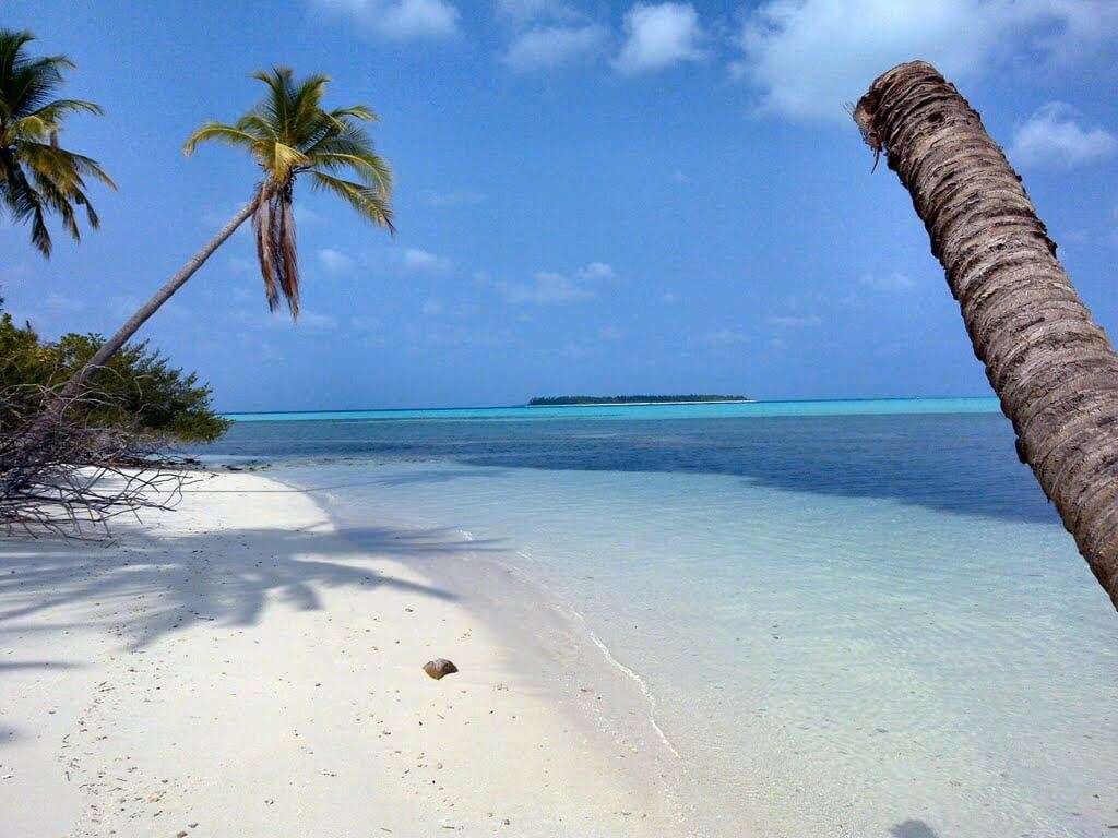 the beautiful blue white sand beach