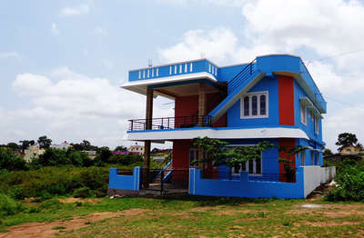 Dreamland Homestay building painted blue