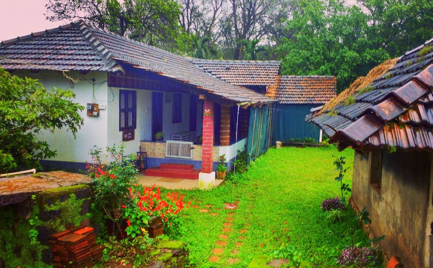 a beautiful old homestay with a small lawn