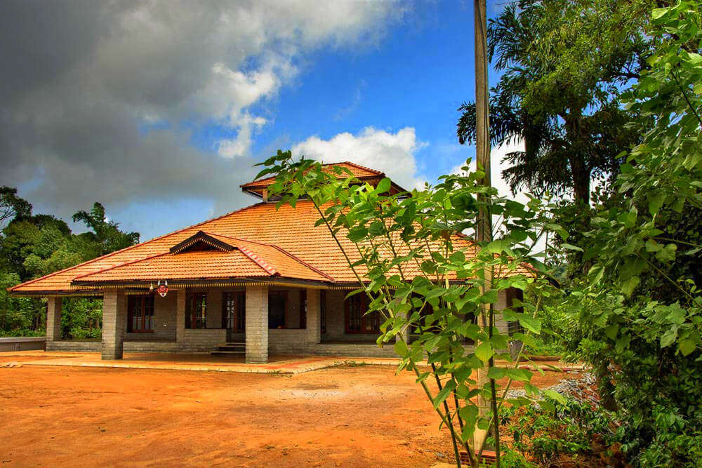 a traditional style Karnataka home with a huge verandah