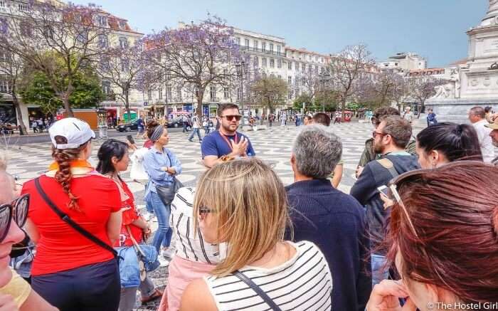 People enjoying walking tour in Europe