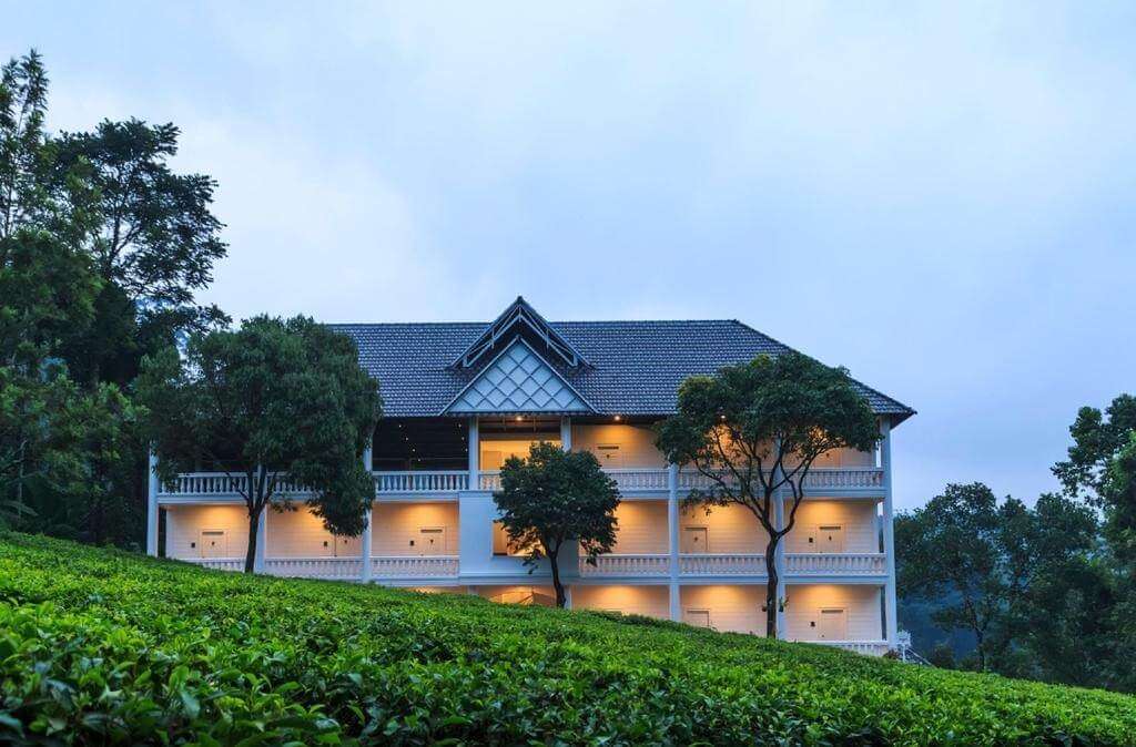 a beautiful hotel building llit at night