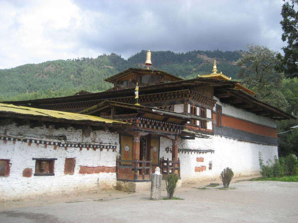 an old monastery with golden decoration in Bhutan