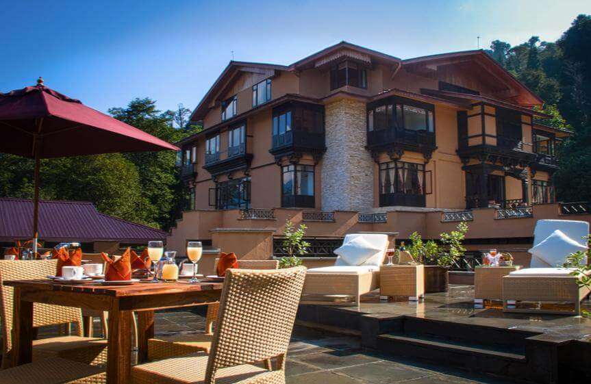 a breakfast table outside a resort