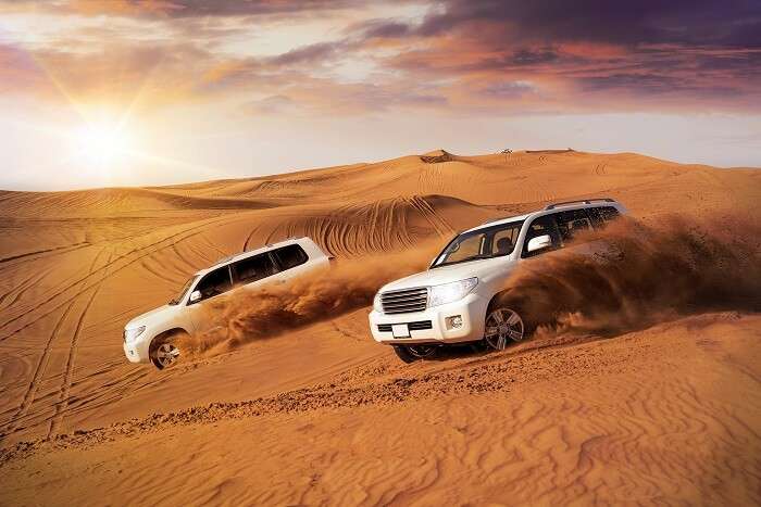 go dune bashing during desert safari