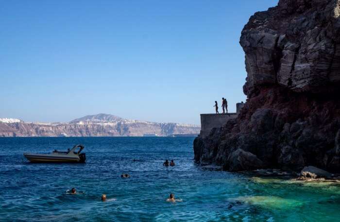 cliff jumping at Amoudi Bay