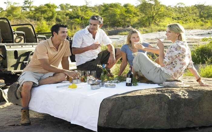 Four people enjoying picnic in the Kruger National Park region 