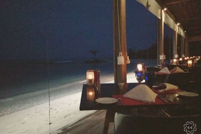 candlelight dinner on beach ambuj honeymoon