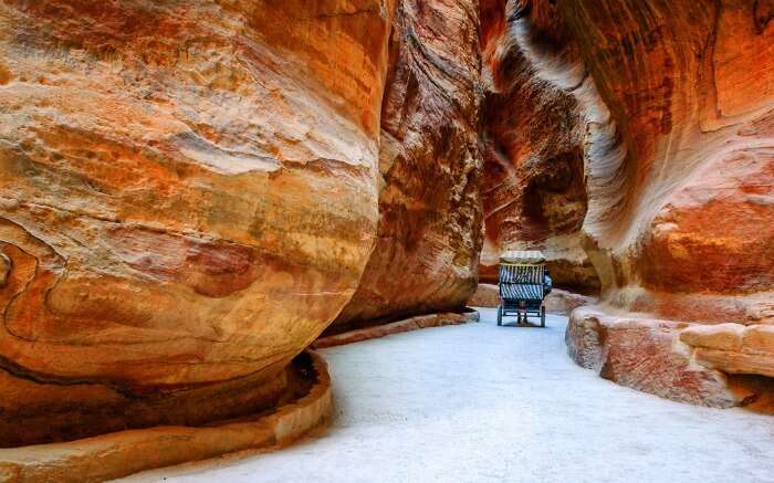 Siq narrow stone gallery in Petra