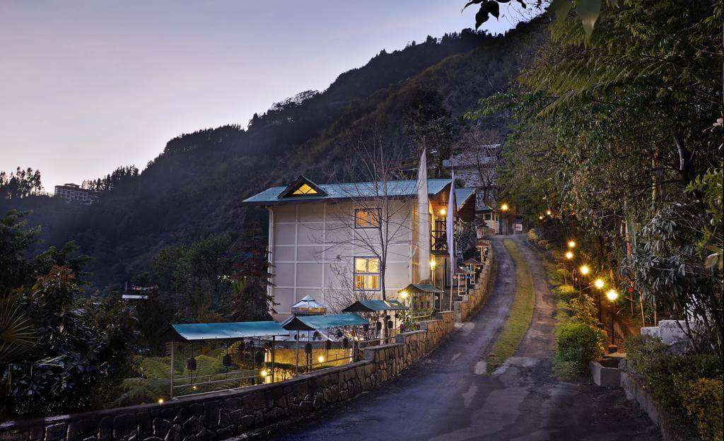 a resort near road in mountains