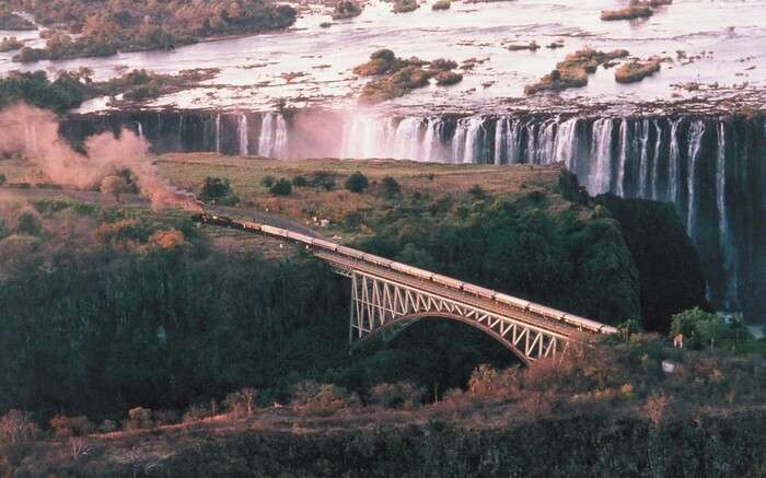 Aerial view of a Rovos Rail running past Victoria Falls in South Africa