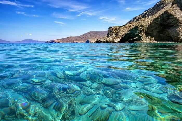 Clear transparent turquoise sea waters in Gyaros island