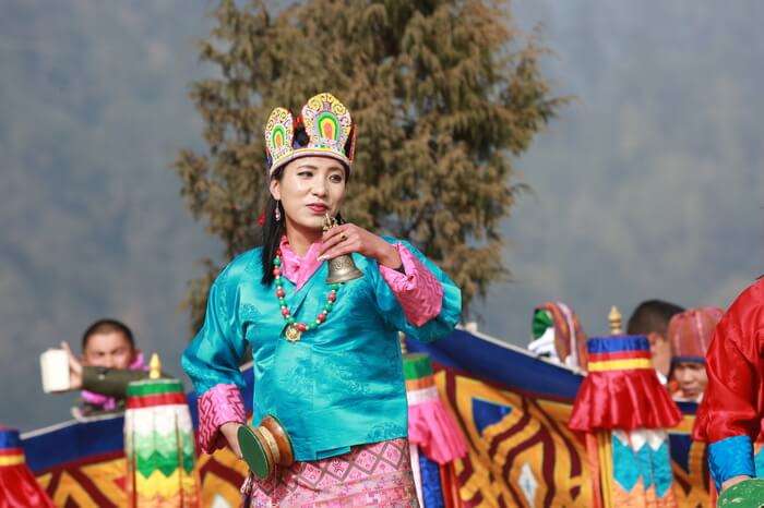 a Bhutanese woman performing dance