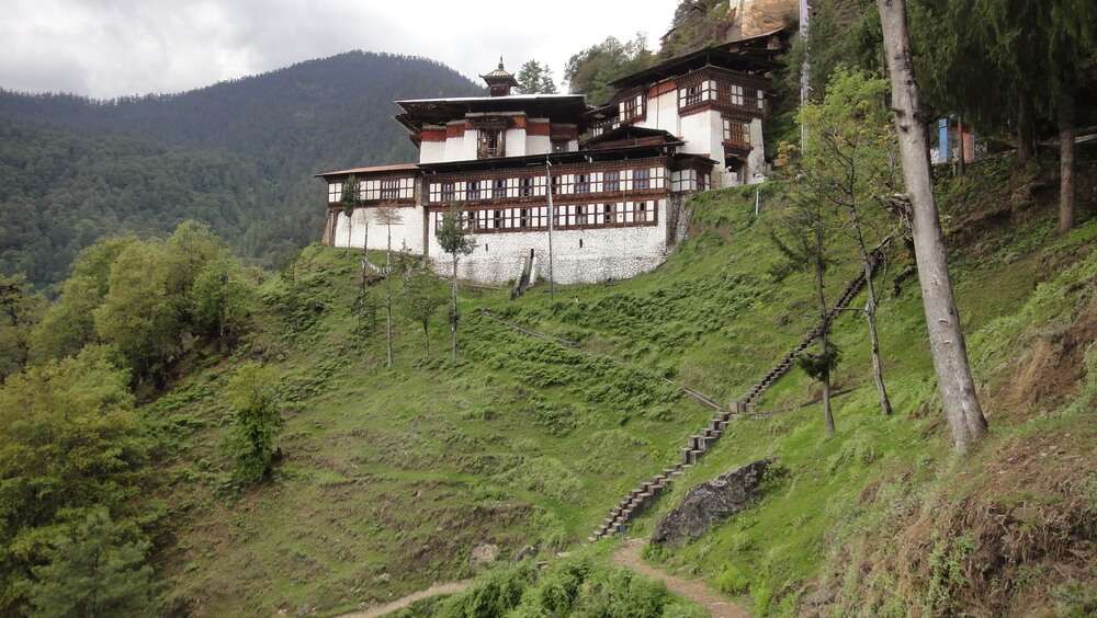 a monastery by a hillside