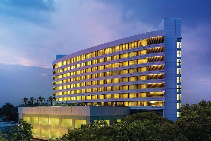 An evening shot of the main building of Vivanta by Taj hotel in Coimbatore