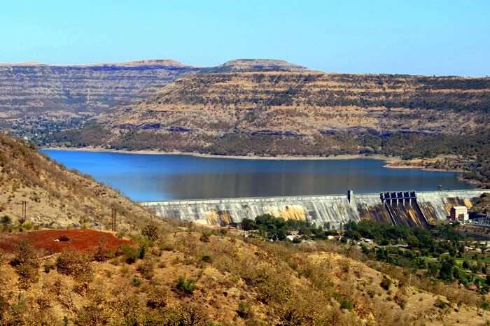 visit the Chas Kaman Dam in bhimashankar wildlife sanctuary