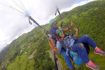 narayan's wife paragliding on her nepal trip