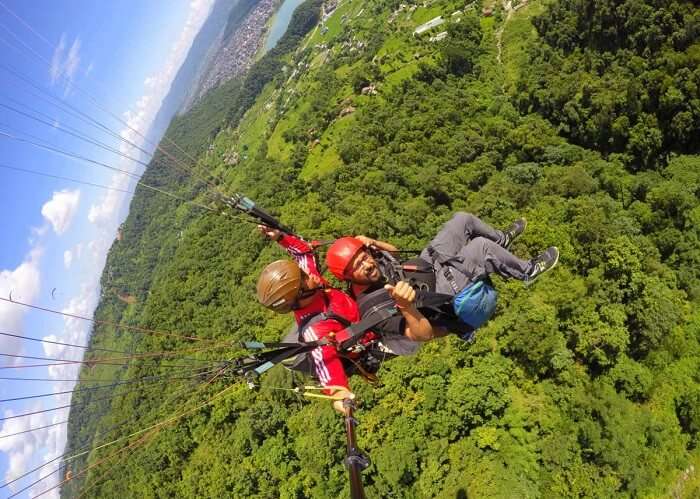 narayan paragliding in nepal on their romantic nepal vacation