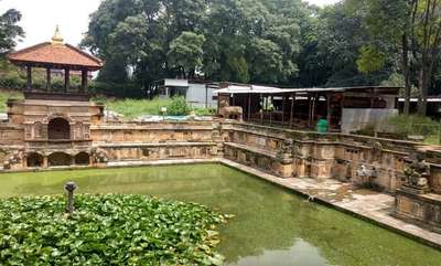 narayan visiting pond near temple in nepal