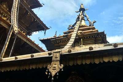narayan checking out religious site in nepal with gorgeous architecture