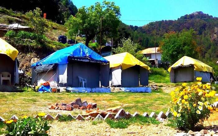 Tents with plastic roof in the mountains 
