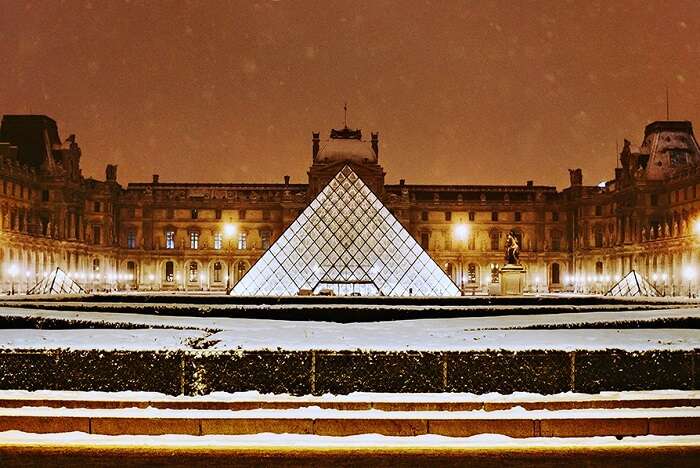 witness stunning works of art at The Louvre Museum in paris in winter