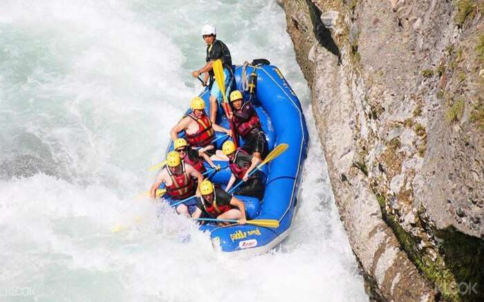 Top view of a boat with rafters in Upper Seti River in Nepal