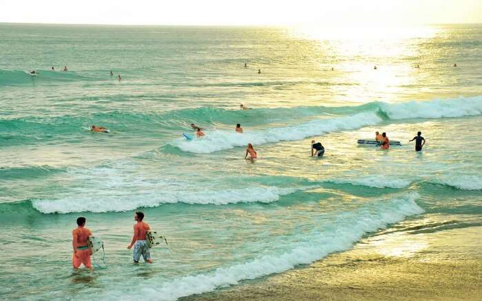 Tourists at Echo beach in Canggu in Bali