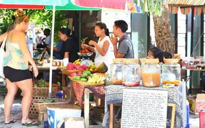 Tourists at local Sunday market in Canggu in Bali
