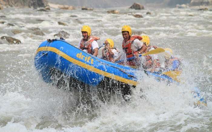 Youngsters enjoying rafting in Trishuli river in Nepal