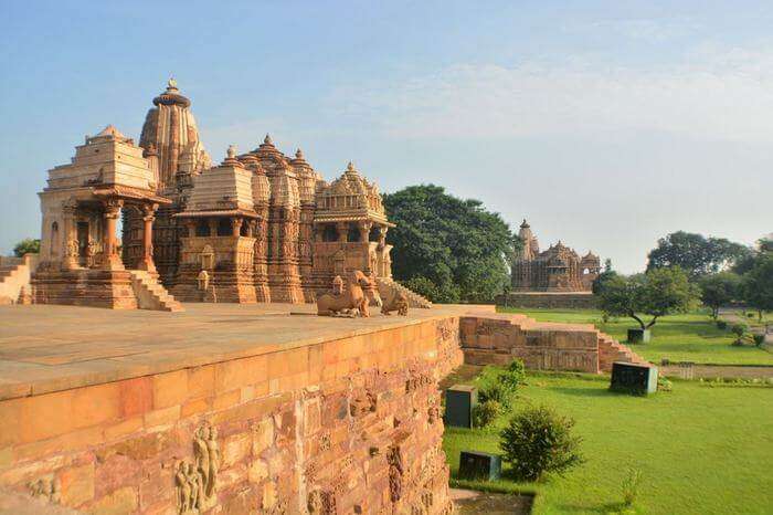 beautiful temple of Khajuraho with a green lawn