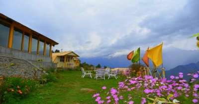 a beautiful cottage with a ground